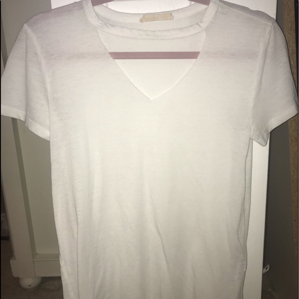 white tee shirt which neck cut out